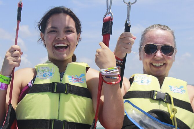 2 in 1 Parasailing and Jet Sky Tour in Cancun - The parasail flight above Cancun