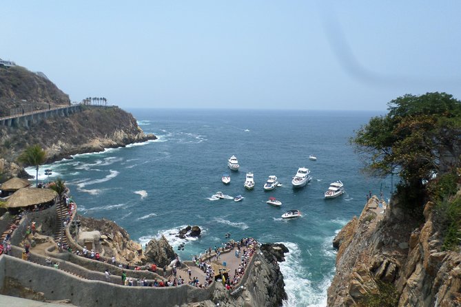 Acapulco City Tour - Puerto Marqués opens with a wide coastal view