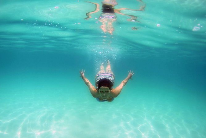All-Inclusive Catamaran Tour | Beaches & Sea Lions from Los Cabos - Snorkeling, paddling, and the practical comforts