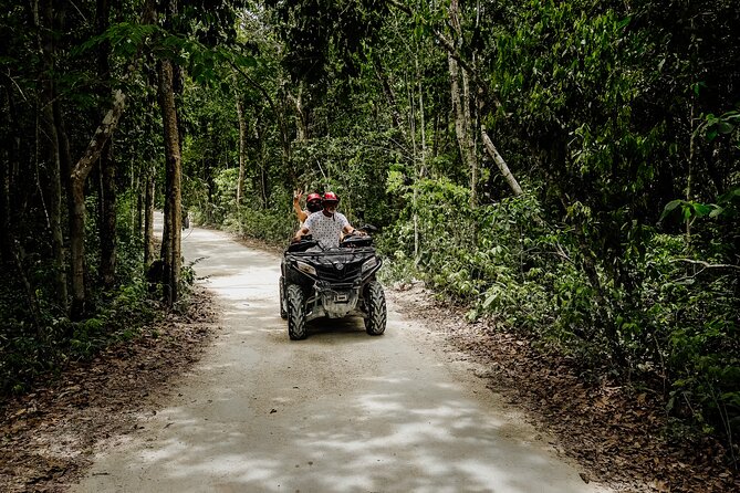 ATV 4×4+Snorkeling+Beach Club+ Lunch+Sabores de Cozumel - ATV trails with mud, rocks, and open riding space