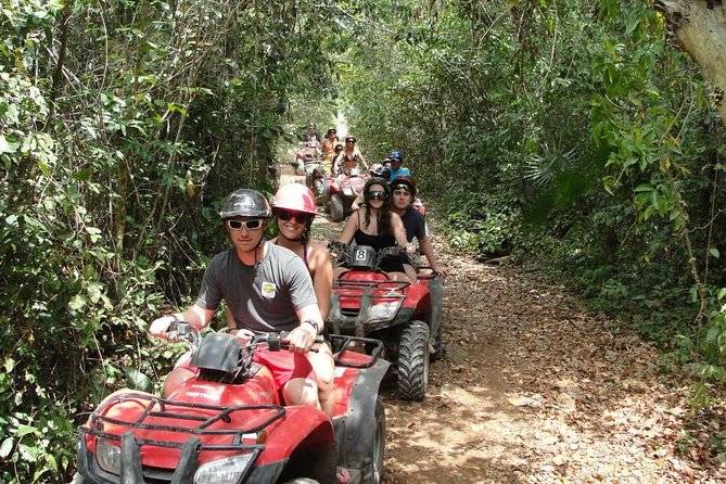 ATV Adventure Combo with Snorkeling, Ziplines, Cenote, and Lunch - ATVs through the jungle and mud