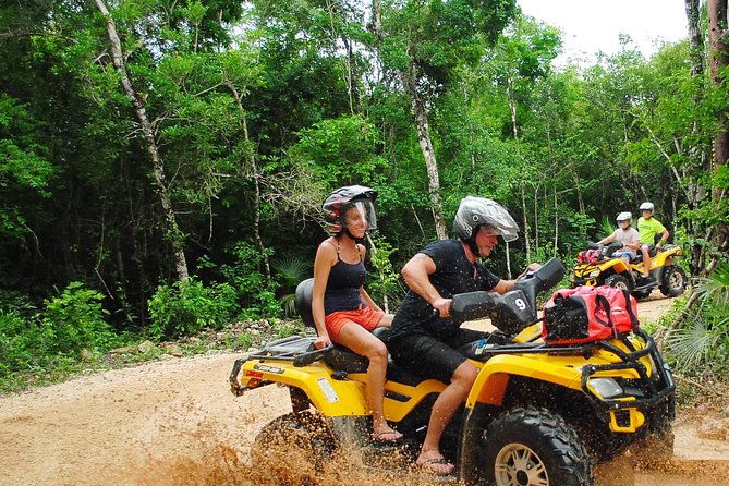 ATV Xtreme and Zipline Tour from Cancun - A limestone cenote with cool freshwater