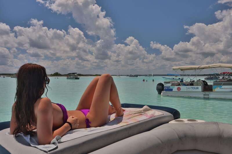 Bacalar: 3-hr Pontoon Boat Tour with Beach Club + Kayaks - Drinks, snacks, and the value of $29