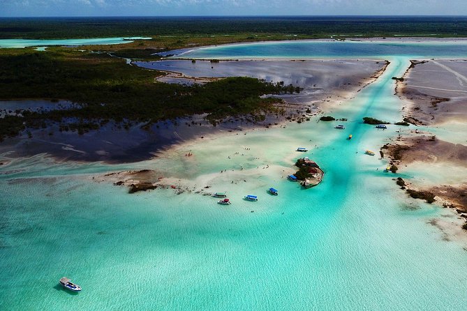 Bacalar – 7 Colors Lagoon Excursión Costa Maya - Pontoon time, swimming, and fresh pineapple