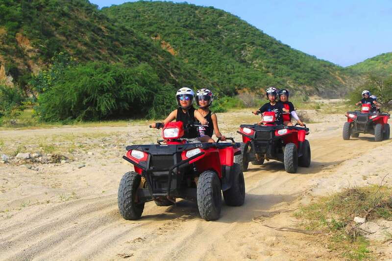 Cabo: Beach & Desert Single ATV Tour with Tequila Tasting - Riding the shore at Migriño Beach