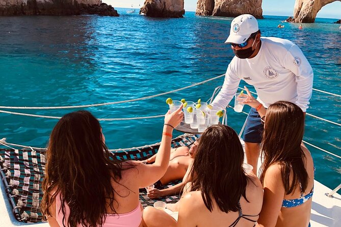 Cabo San Lucas and Santa Maria Bay Snorkeling Sightseeing Cruise - Lunch, open bar, and the party-boat mood
