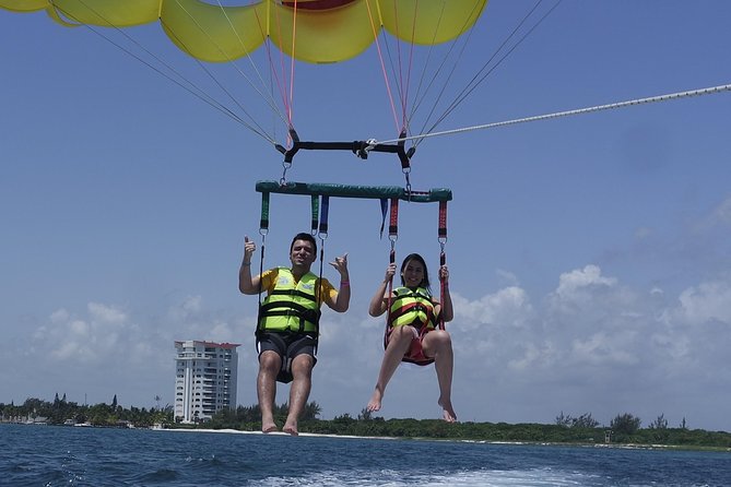 Cancun Adventure: Reef Snorkeling & Parasailing Experience - Safety, weather, and comfort in the water