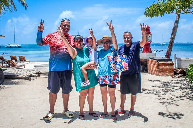 Cancun All Inclusive Catamaran Tour to Isla Mujeres - Sailing south with music, drinks, and a busy deck
