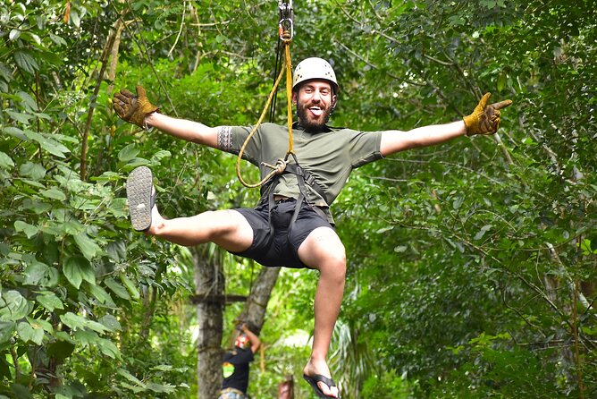 Cancun ATV Jungle Adventure, Ziplines, Cenote and Tequila Tasting - Three ziplines above the trees