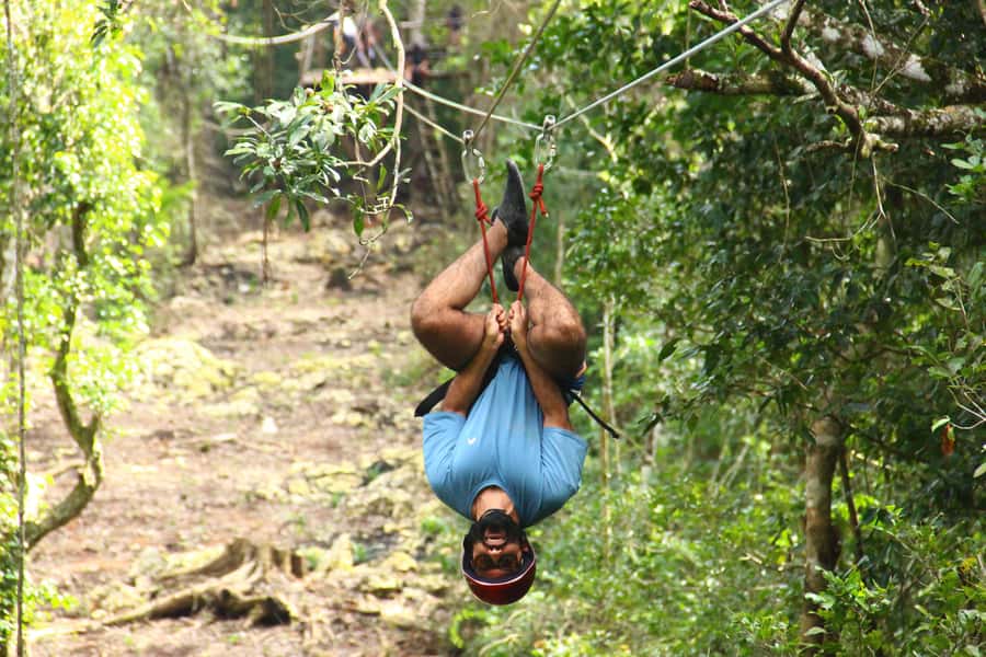 Cancún: ATV, Zipline, and Cenote Adventure with Lunch - Ziplining above the Mayan jungle
