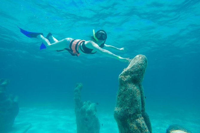Cancun Half-Day Sailing Catamaran Cruise to Isla Mujeres - A half-day at sea from Playa Langosta