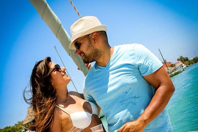 Cancun Half-Day Sailing Catamaran Cruise to Isla Mujeres - Snacks, drinks, and the party-boat mood