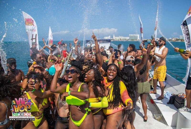 Cancun: Hip Hop Sessions Party Boat Cruise - Champagne showers, photos, and crowd interaction