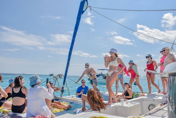 Cancun's Best: Catamaran to Isla Mujeres, Snorkeling & Drinks! - Sailing toward Isla Mujeres with music and drinks