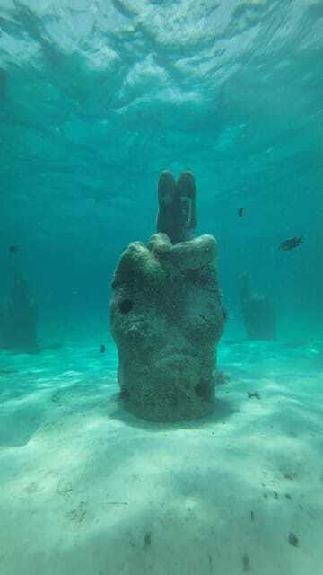 Cancun: Snorkeling Boat Tour with Gear - A shipwreck on white sand
