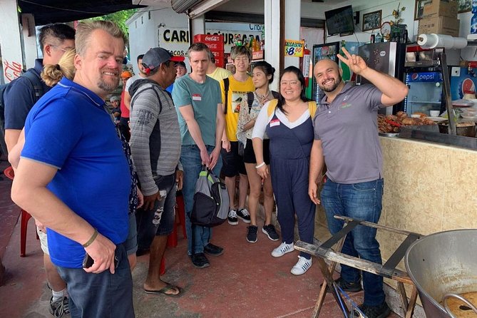 Cancun Street Food Tour with Food Stalls, Local Market and Murals - Mercado 23: browsing, shopping, and a pause between bites