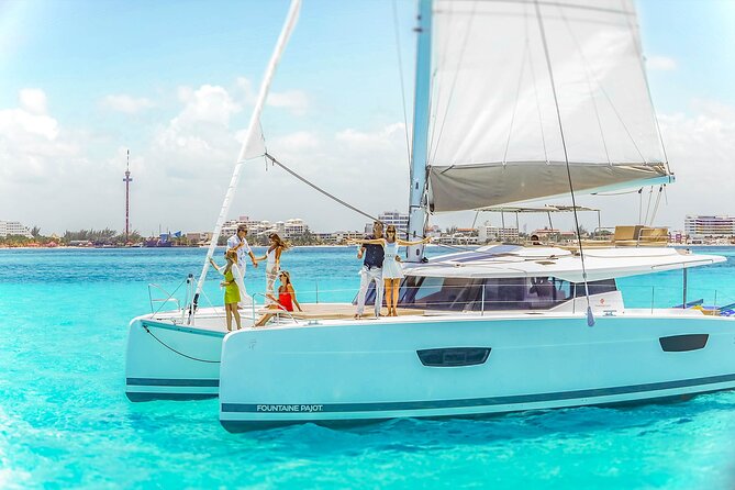 Catamaran to Isla Mujeres Snorkeling Tour with Open Bar and Lunch - Spinnaker flights and the open bar