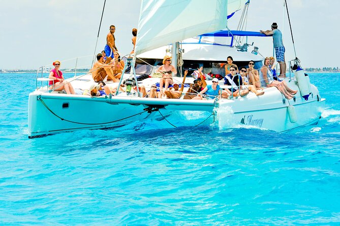 Catamaran to Isla Mujeres Snorkeling Tour with Open Bar and Lunch - The beach club, buffet, and late lunch
