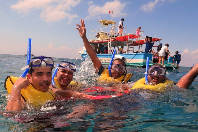 Cozumel Coral Reef Snorkeling by Glass Bottom Boat with Guide - Guides who take safety seriously