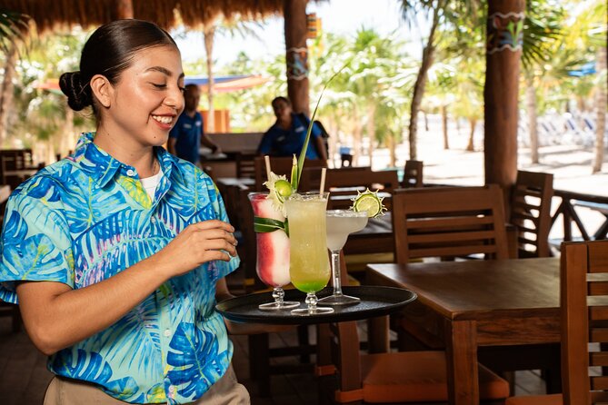 Cozumel: KUZÁ Beach Day, Buffet, Open Bar & Mexican Flavors Class - Beach time, hammocks, and cultural activities