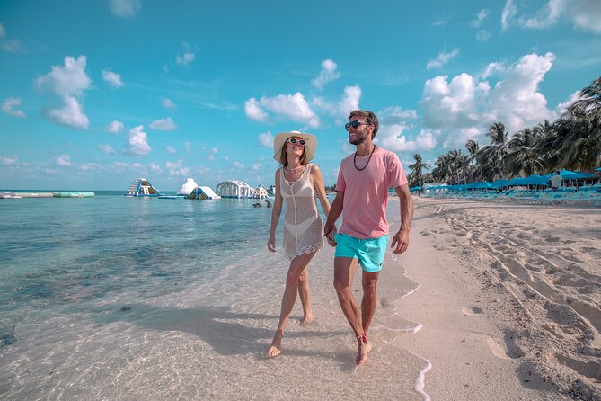 Cozumel: Paradise Beach Club All-Inclusive Day Pass - The beach, pool, and palm-shaded chairs