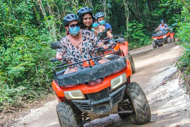 Drive an Atv shared, swim in a Cenote and ziplines in the Cancun - Cooling off in the cenote
