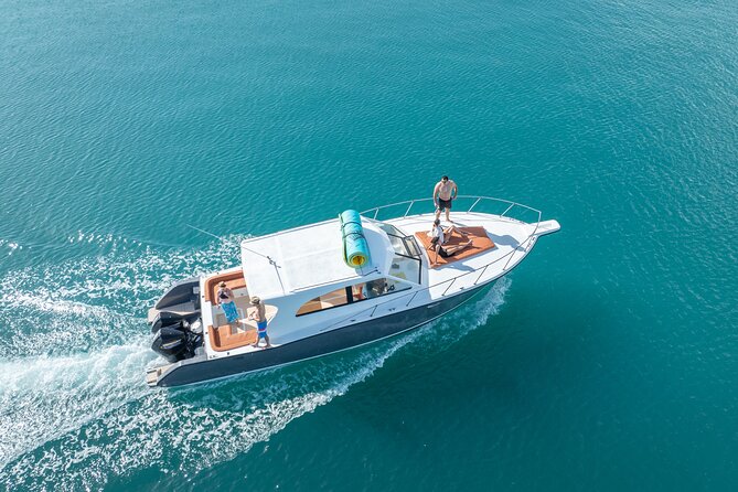 Exclusive Isla Mujeres and Cancun Private Yacht Tour - Snorkeling along Isla Mujeres