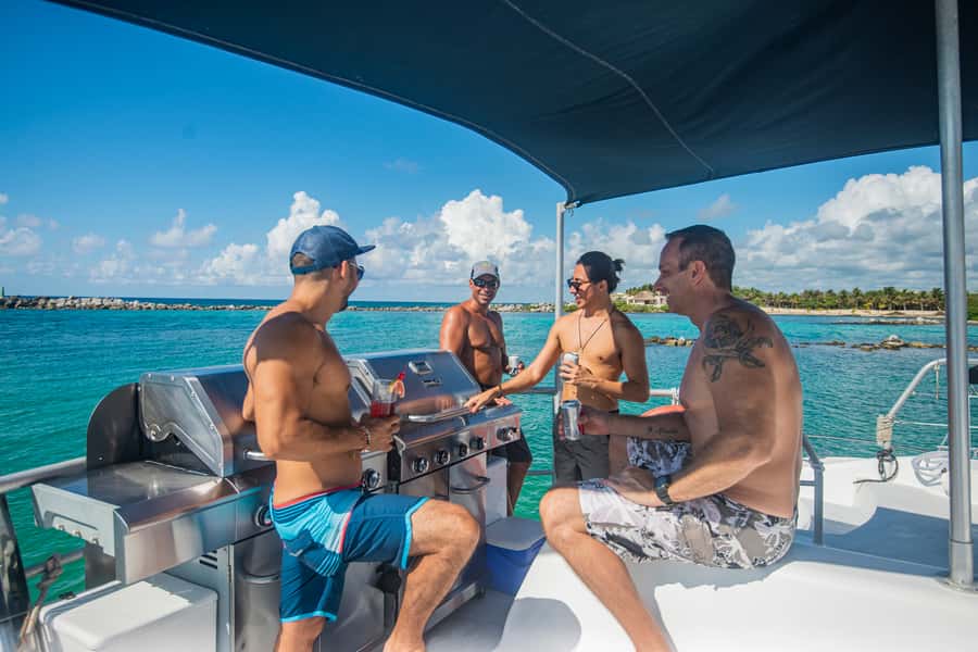 From Puerto Aventuras: Share Catamaran Tour - BBQ lunch and the open bar