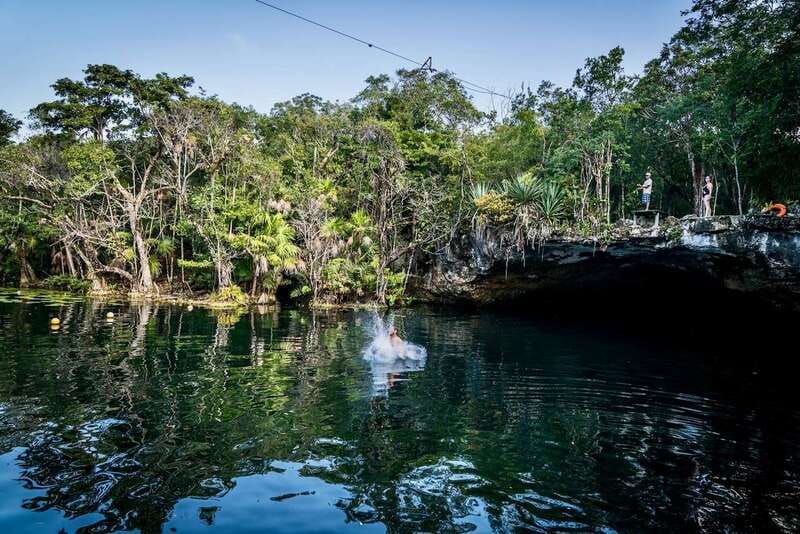 From Tulum: Four-Cenote Adventure - Canoeing toward Cenote Azul