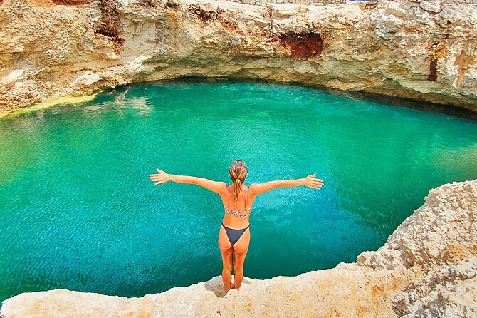 Hidden Cenote Swim & ATV Jungle Adventure with Transportation - Riding a Can-Am Outlander through the forest