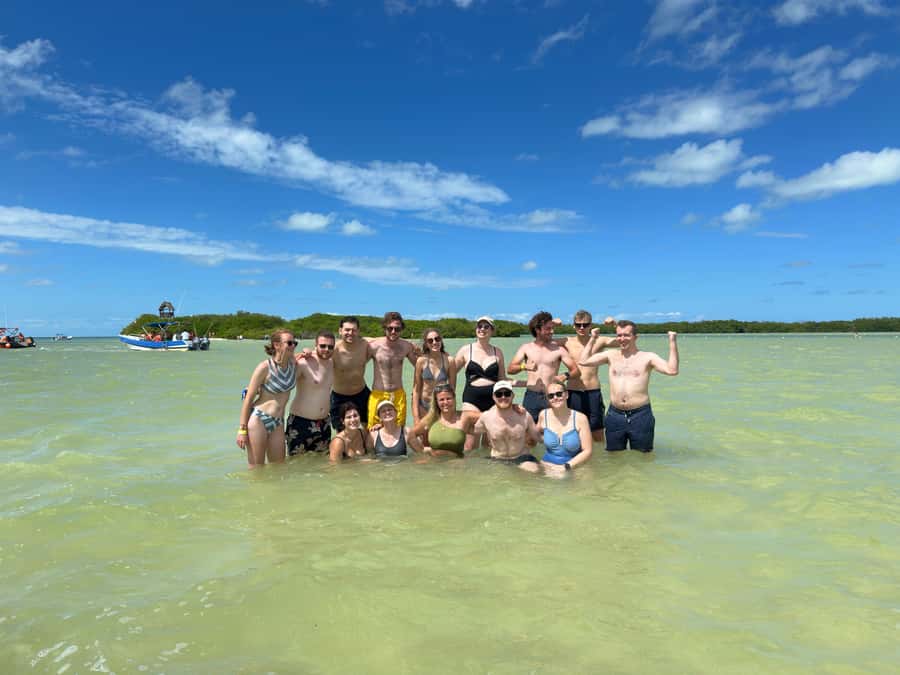 Holbox: Punta Mosquitos, Yalahau, & Pasión Island Boat Tour - Boat pickup, timing, and guide communication