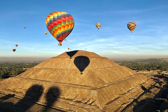 Hot Air Balloon Flight with Breakfast Cave and Pyramids Tour - The balloon flight: gentle, open, and weather dependent