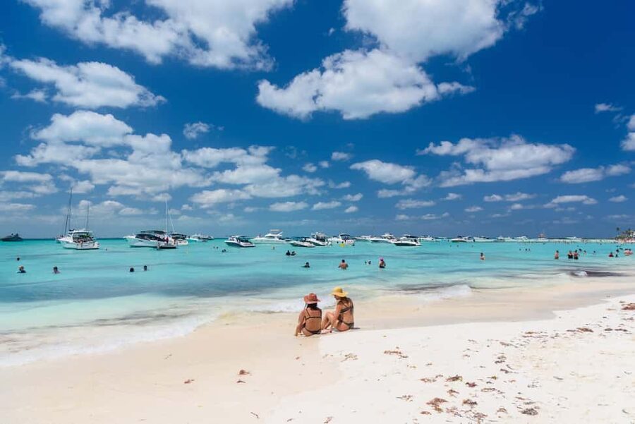 Isla Mujeres: Catamaran Ride with Open Bar, Snorkeling, and Lunch - Sailing from Cancun on a lively catamaran