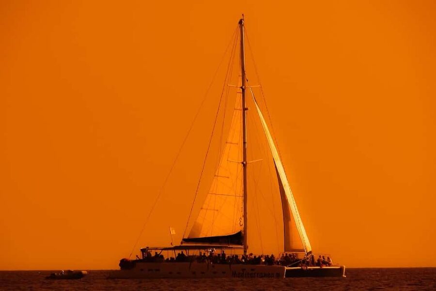 Isla Mujeres: Catamaran Ride with Open Bar, Snorkeling, and Lunch - A short snorkel stop in clear Caribbean water