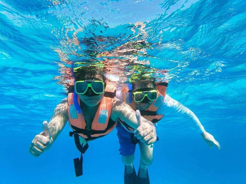 Isla Mujeres: Catamaran with Open Bar, Snorkeling and Lunch - The reef stop: colorful fish, statues, and limited time