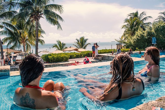 Isla Mujeres luxury catamaran with premium open bar and lunch - Drinks, service, and the small-group promise