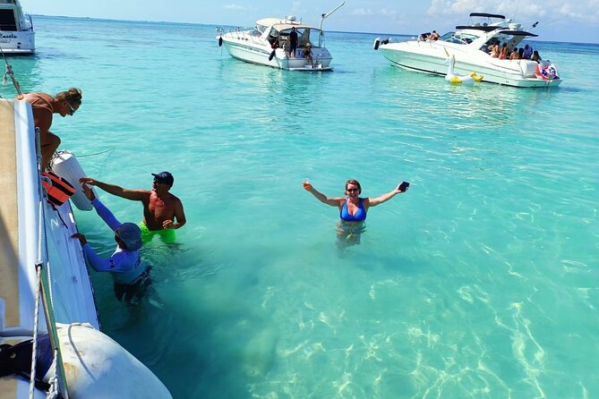 Isla Mujeres Premium Tour in Private Catamaran with Lunch - Sailing back with sunset views