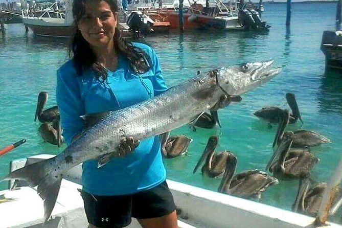 Local Fishing Plus Snorkeling Tour in Isla Mujeres - A 90-minute snorkel over coral and fish