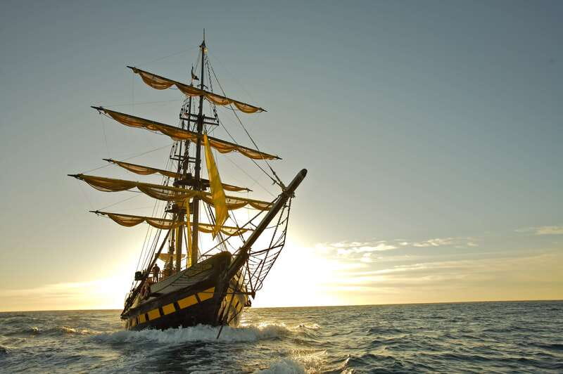 Los Cabos: Pirate Ship Sunset Cruise & Show with Dinner - Los Arcos at sunset, with Lover’s Beach and Pelican Rock
