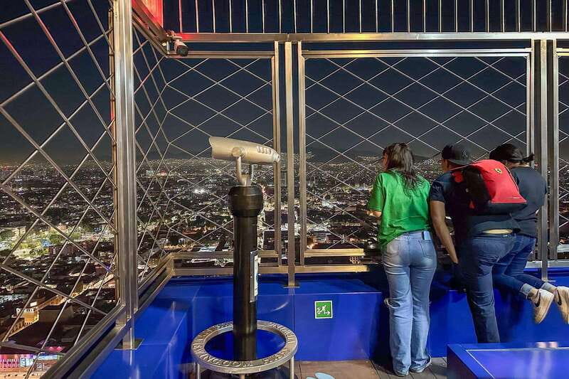 Mexico City at Night Walking tour with optional Torre Latino - The Zócalo, Cathedral, and National Palace