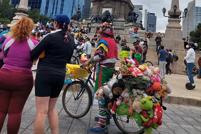 Mexico City E-Bike Tour with a taco and churros stop - El Ángel and the city’s patriotic symbols