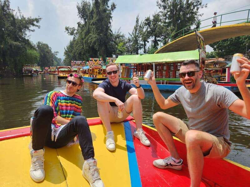Mexico City: Xochimilco Boat with Guacamole & Premium Drinks - What the guide adds to the ride