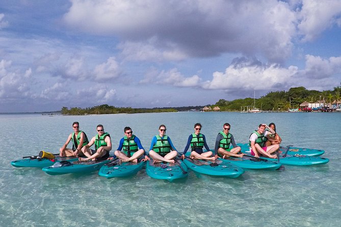 Paddleboarding and/or kayaking tour at sunrise in the lagoon of Bacalar - Weather, cancellations, and practical limits