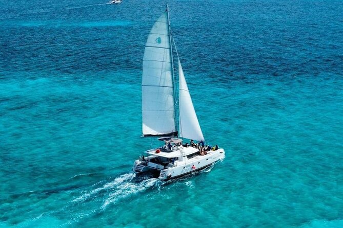 Plus Full Day Catamaran Tour to Isla Mujeres All Inclusive - A lively six-hour ride from Cancun