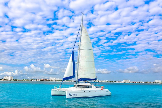 Private Catamaran from Cancun to Isla Mujeres | For up to 30 pp - First stop: the Cancun Underwater Museum and Manchones Reef