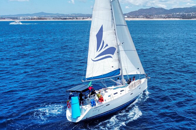 Private Sailboat tour in Cabo San Lucas with Papillon Yachts - Médano Beach, snacks, and water time