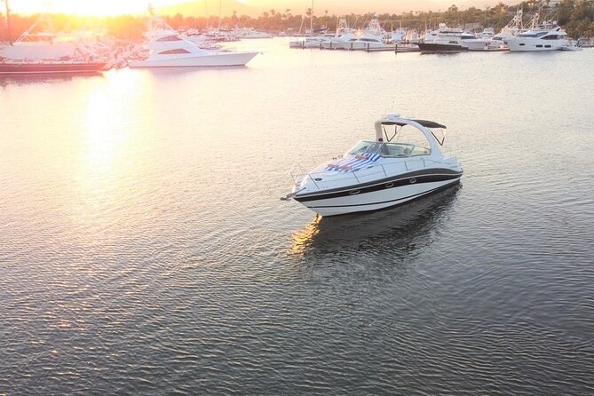 Private yacht charter for cruising & snorkeling in Cabo San Lucas - Paddle board, floating mat, and time in the water