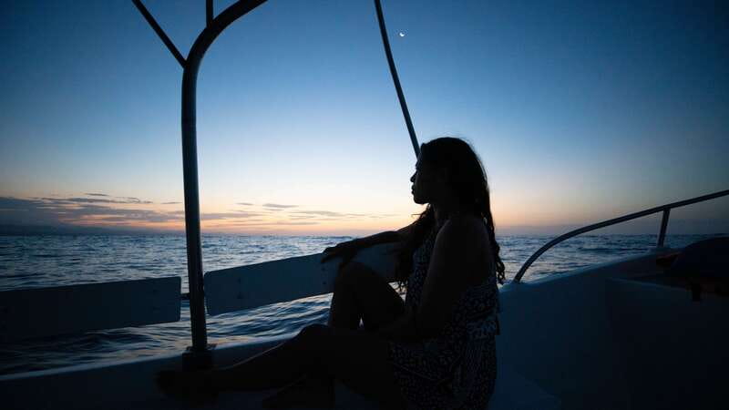 Puerto Escondido: Boat Tour among Dolphins and Turtles - Boarding the boat along the Oaxacan coast