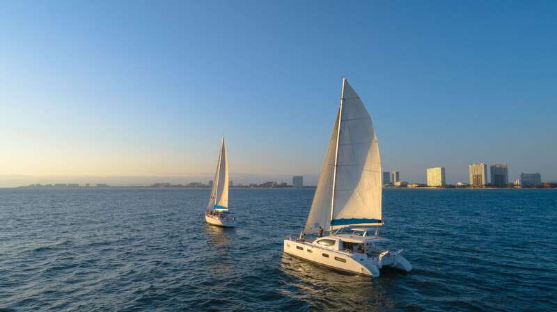 Puerto Vallarta: Bay of Banderas Luxury Sunset Sailing Tour - Sailing out for a Puerto Vallarta sunset