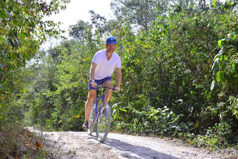 Rio Secreto Nature Reserve: Bicycle, Rappel & Ziplines Tour - Getting ready with wetsuit, helmet, and headlamp